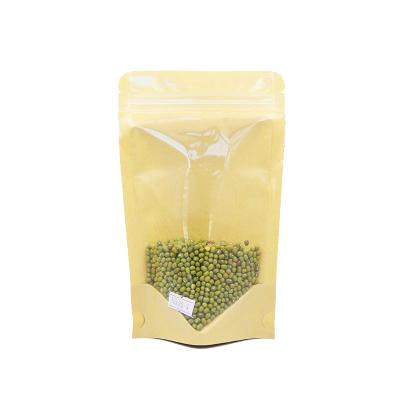 China Moisture Proof Stand Up Pouch One Side Clear Transparent Kraft Paper Bags One Side for sale