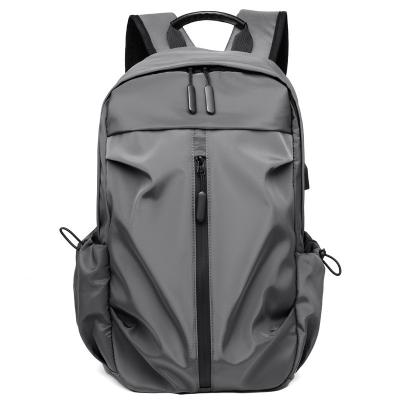 China With 2021 New USB Backpack Men's Business Casual Wear Computer Bag USB Travel Student Foreign Trade Filling Backpack for sale