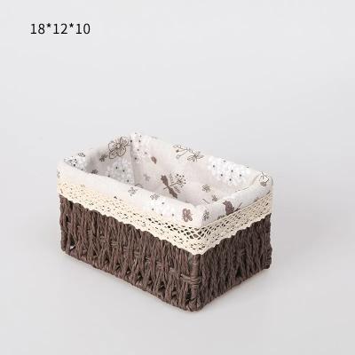 China Rattan Storage Box Stored Desktop Cosmetics Toys Storage Basket Household Cloth Hot Sale For Filipino for sale