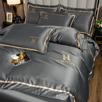 China Luxury 60s Solid Color Embroidery Non-Toxic High Washed Silk Four Piece Bedding Sets Gray Hotel Red Wedding for sale