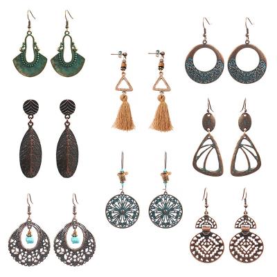 China FASHIONABLE Jewelry Wholesale Boho Chic Geometric Earrings Hollow Shield Retro Shape Hammered Drop Earrings for sale