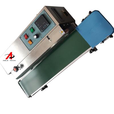 China High Efficiency Automatic Continuous Sealing Machine Nitrogen Lettering Film Bag Sealer Machines for sale