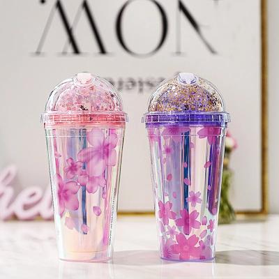 China 480Ml Cherry Blossom Sparkle Gel Inside Single Wall Double Ice Cream Cup Colorful Double Insulated Plastic Cups With Straws for sale