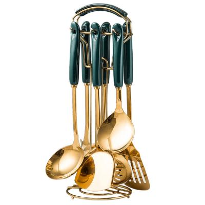 China Sustainable Gold Stainless Steel Kitchenware Cooking Untensils Set With Rack for sale