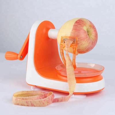 China Amazon Sustainable Hot Selling Plastic Rotary Hand Held Apple Pear Slicer And Peeler For Home Use for sale