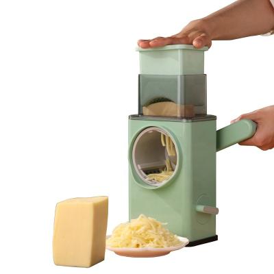 China Sustainable Plastic Manual Round Cheese Grater Vegetable Slicer With Enlarged Port And Food Feeding Blades for sale