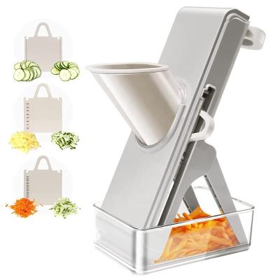 China Viable Safe Hand Pusher Vegetables and Fruit Cutter Food Slicer Kitchen Tool with 3 Blades and Containers for sale