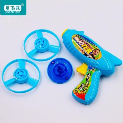 China Capsule Toys Flying Saucer Luminous Top Gun Dragonfly Pistol Ejection Kids Toys Hard Candy Flying Bamboo Capsule 2 Years Old for sale