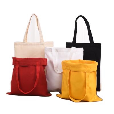 China Large Natural Eco Friendly Organic Carry On Cotton Canvas Folding Bag Prospecting Tote Bags Reusable Shopping Bag for sale