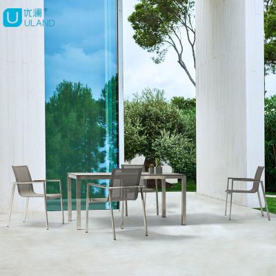 China (Others) Uland Style Adjustable Nordic Hpl Top Tables And Chairs Dining Furniture Steel Dining Tables Set for sale