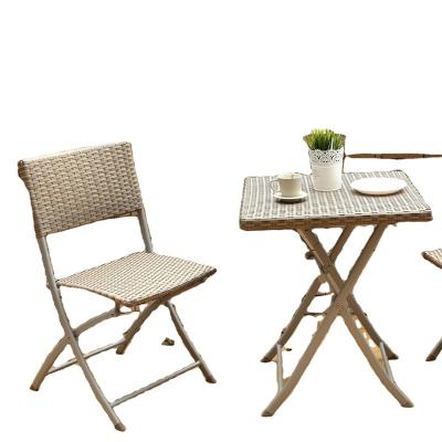 China Uland Steel Wicker Modern Folding Outdoor Table and Chair Set, Patio Furniture Sets, Outdoor Garden Furniture for sale