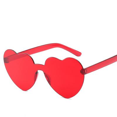 China Wholesale 100% 400 Protection Eyewear Candy Color PC Sun Glasses Fashionable UV Loving Glass Heart Shape Sunglasses Women Rimless Custom Frameless Glass New for sale