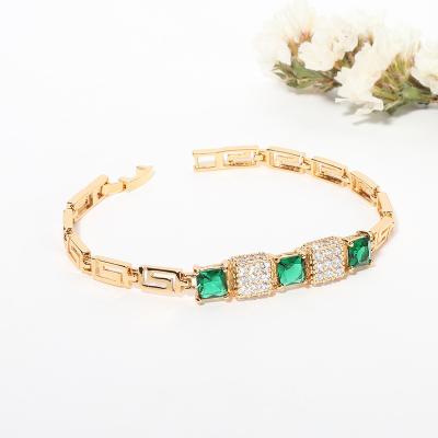 China Trendy Fashion Jewelry Luxury Gold Plated Emerald Stone Zircon Cut Bangles Couples Bracelet for sale