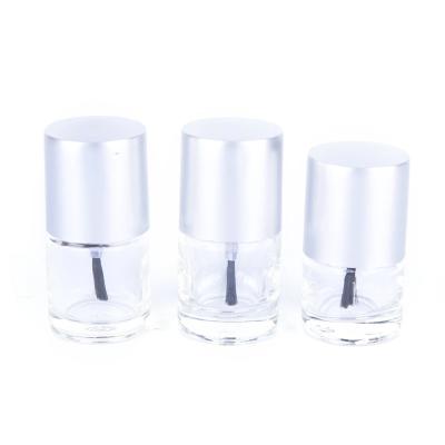 China Manufacturer Hot Selling Popular Transparent Round Glass 5ml 10ml Refillable Nail Polish Oil Bottle With Silver Brush Lid for sale