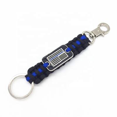 China Outdoor Sports 550 Paracord Survival Key Chain with American Flag 550 Nylon Paracord Key Chain for Camping and Hiking for sale