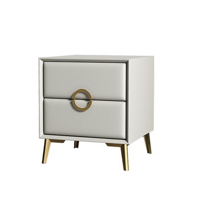 China Modern Sleek and Elegant Design Chipped Stone Top Quality Leather Modern Bedside Table for sale