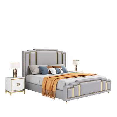 China Comfortable Gold Stainless Steel Frame Soft And Modern Upholstered Bed for sale