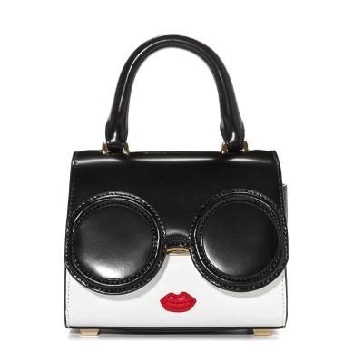 China New fashion beauty face fashion spliced ​​women bag cartoon personality design unique handbag for sale