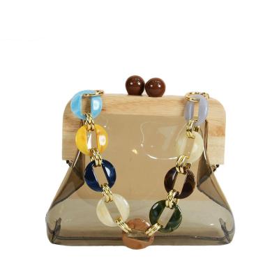 China New Fashion PVC Trend High Quality Candy Color Transparent Acrylic Wooden Clip Jelly Bag for sale