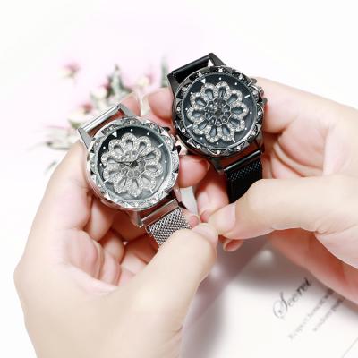 China Lucky Flower Time Running Watches 360 Degree Rotating Dial Lady Watch Magnet Milan Mesh Alloy Women Watches Ladies for sale