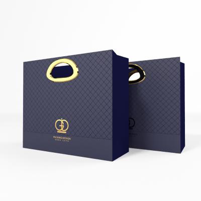 China Luxury High End Paper Kraft Paper Bags Disposable Handmade Paper Shopping Gift Packaging Bags for sale