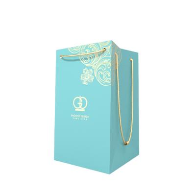 China Wholesale Handmade Green Logo Luxury Cardboard Paper Bag Custom Hot Stamping With Gold Color Ribbon Handles Paper Bag for sale