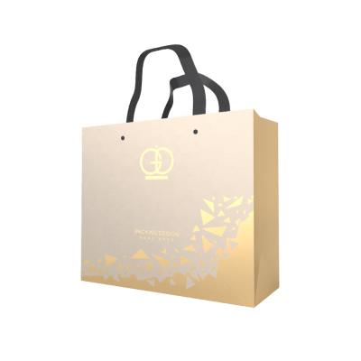 China Logo Gift Packaging Bag Hot Custom Wholesale Handmade Gold Stamping With Ribbon Luxury Paper Handbag for sale