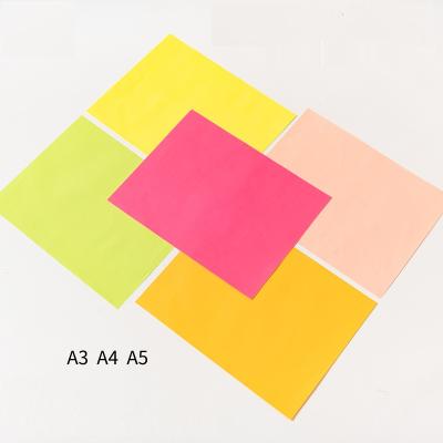 China Rustproof Stock 75 Gsm Colored Fluorescent Red Green Pink Yellow Card Two Side Fluorescent Paper for sale