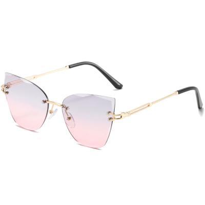 China Fashion Sunglasses New Arrival Rimless Gradient Cartoon Luxury Colorful Cat Eye Sunglasses for sale