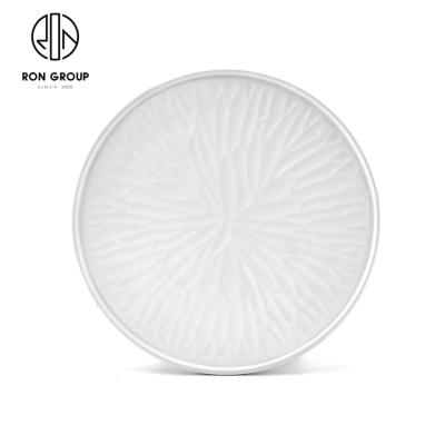 China Sustainable Wholesale Unique Lotus Design Restaurant Hotel Used White Flat Stoneware Ceramic Dish for sale