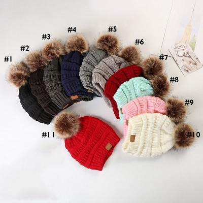 China Custom Winter Beanie Hat With Pom Pom Logo Knitted Knit Cap Hats Hot Selling COMMON for sale