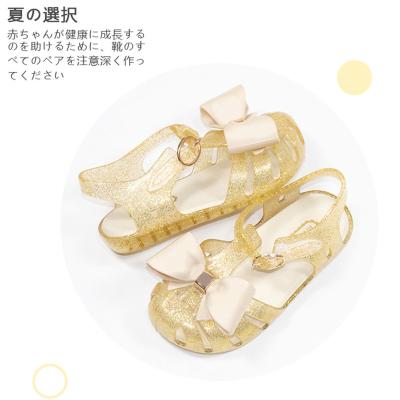 China Lightweight MINI Dual Density 2022 Summer Girls Sandals High Quality Cute Bow Jelly Sandals Children Footwear Kids Beach Flat Walking Shoes for sale