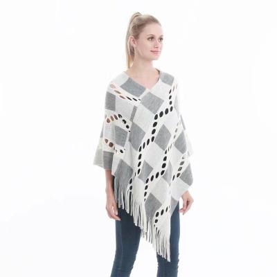 China Hot Selling Newest Classic Shawl Soft Oversized Knit Asymmetric Gradient Poncho Shawl Wrap With Fringe Tassel for sale