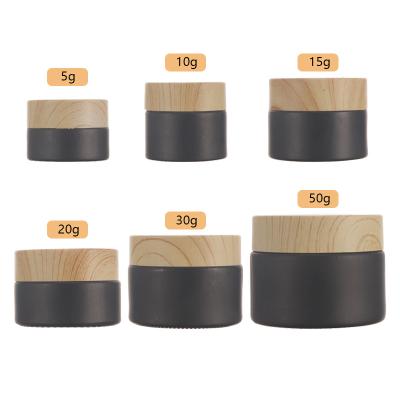 China Wholesale Cosmetic Jar Black Bamboo Wood Grain Personal Care Glass 20g 30g Plastic Lid With Plastic Inner for sale