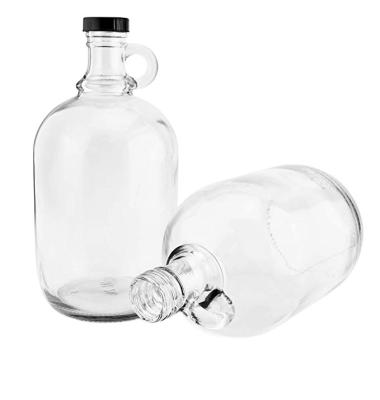 China Hot Selling 32oz 64oz 128oz Beverage Clear Shaker Red Wine Jugs Glass Beer Jug Bottle With Handle for sale