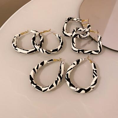 China Environmental Friendly Exaggerate Circle Earrings Zebra Stripe Leather Black White Striped Leather Geometric Hoop Earrings For Women for sale