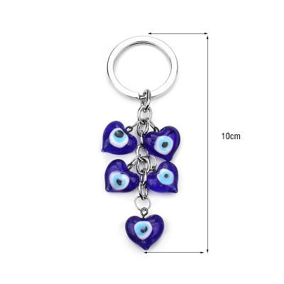 China For Decoration FashionHamsa Evil Eye Key Chain Enamel Oil Drop Keychain Evil Eye Pendant Keychains for sale