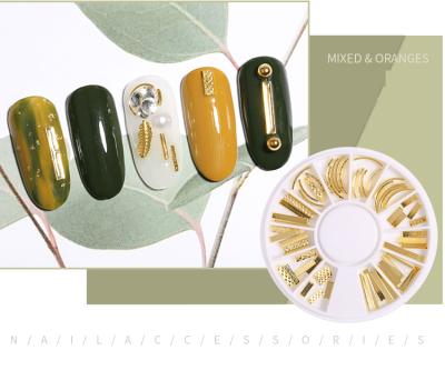 China Metal Studs 5 Designs 3D Metal Nail Art Deco Studs Jewelry Golden Wheel Hot Selling Nail Bars for sale