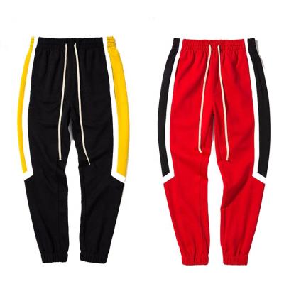 China Wholesale Gym Logo Sports Jogger Pant Anti-wrinkle 100% Cotton Customized Side Striped Men's Joggers for sale