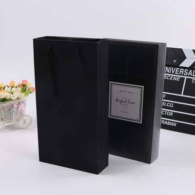 China Recyclable 120gsm Kraft Paper For Shopping Gift Black Biodegradable Custom Carry Paper Bag for sale