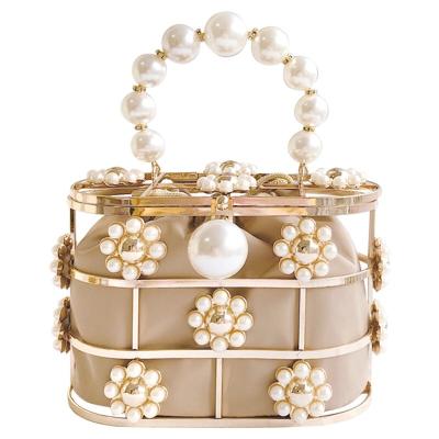 China Fashion /good elegant/all-match touch/high quality hollow out party handmade bead fashion metal cage handbag clutch beaded handbag woman evening bag for sale