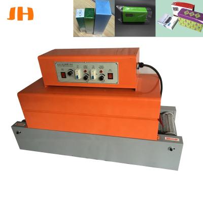 China PE Plastic Thermal Foil Wrapping Food Shrink Wrapping Food Heat Shrink Tunnel Machine Small Film Sealing Wrapping Machine for sale