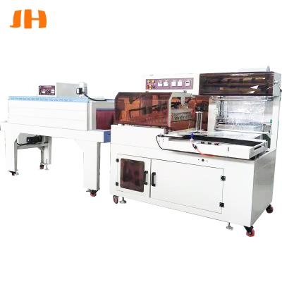 China JHBF450 Food Wrap Machine China Carton Shrink Wrap Machine Heat Shrink Wrapping Tunnel PE Heating Sealing Film for sale