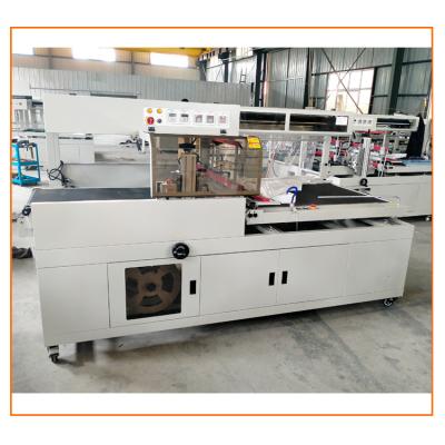 China BF550 Automatic High Speed ​​Food Heat Shrink Paper Wrapping Machine PE Thermal Plastic Film Packing Machine China Shrink Tunnel Sealing for sale