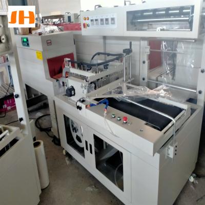 China BF850 Automatic Food Bottle Tunnel Shrink Film Packaging Machine Heat Shrink Sealing Machine And Slitter Tunnel for sale