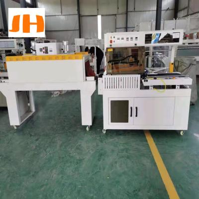 China L450 L automatic food box l shrink wrap machine POF film carton box sealer automatic crate sealer rigid wrap iphone bottle for sale