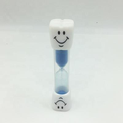 China Art Decor 2 Minute Smile Tooth Sand Timer Dental Hourglass for sale