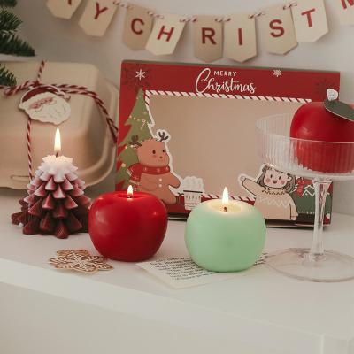 China Eco-Friendly Wholesale Apple Shaped Aromatherapy Christmas Eve Candle Fragrance Aromatherapy Scented Candles for sale