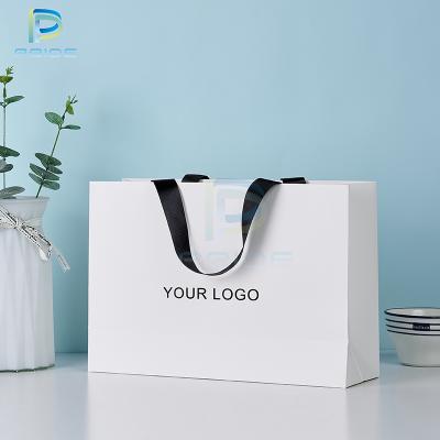 China New Biodegradable Black White Recyclable Printed Kraft Packaging Bags Foldable Custom Paper Shopping Bag With Logo for sale