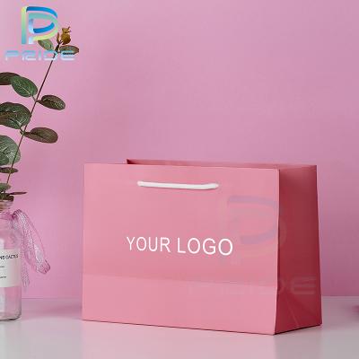 China Custom Carton Biodegradable Matte Luxury Gift Shopping Pink Logo Paper Bag With Handle Fashion Printing Papel Cosmetics for sale